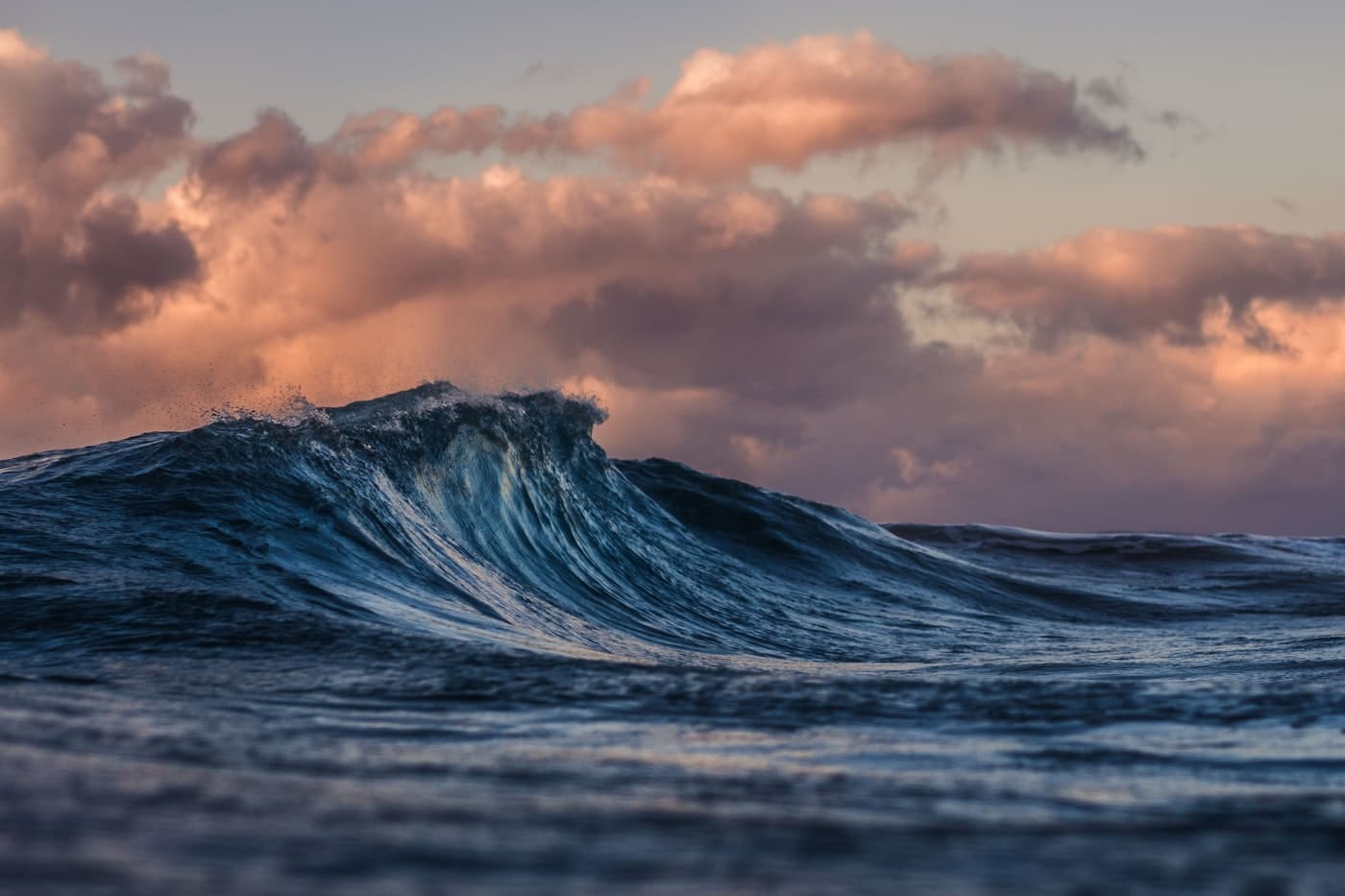 Atlantic swell beneath a warm evening sky
