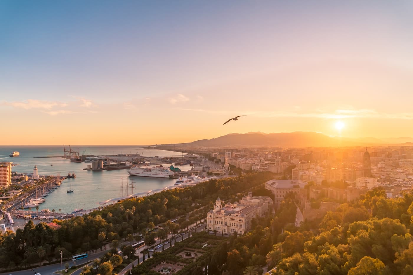 A Mediterranean coastal city at sunset